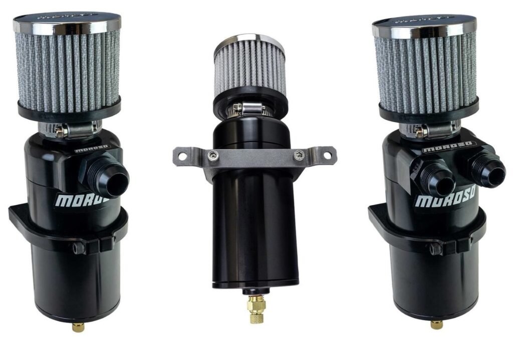 Three Moroso billet catch cans on a white background: a single-inlet can, a rear view showing the mounting bracket and petcock drain, and a dual-inlet can